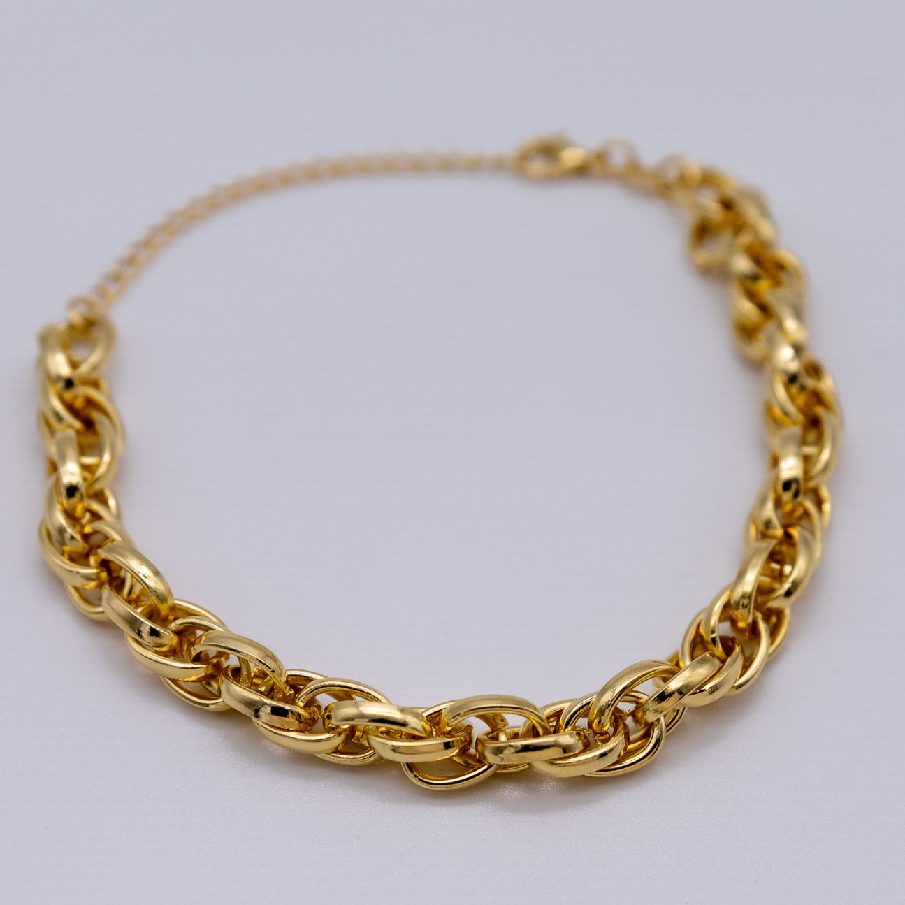 BRACCIALE A MAGLIE INTRECCIATE SPESSE