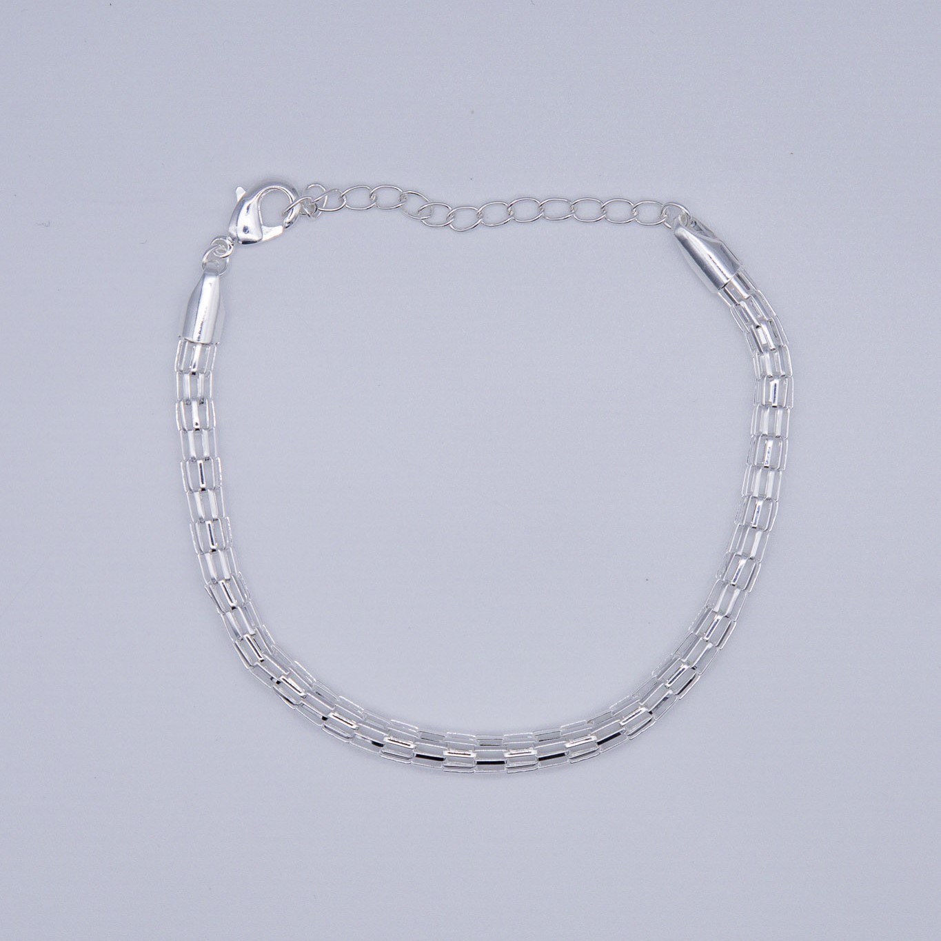 BRACCIALE CON PICCOLE CATENE INTRECIATE