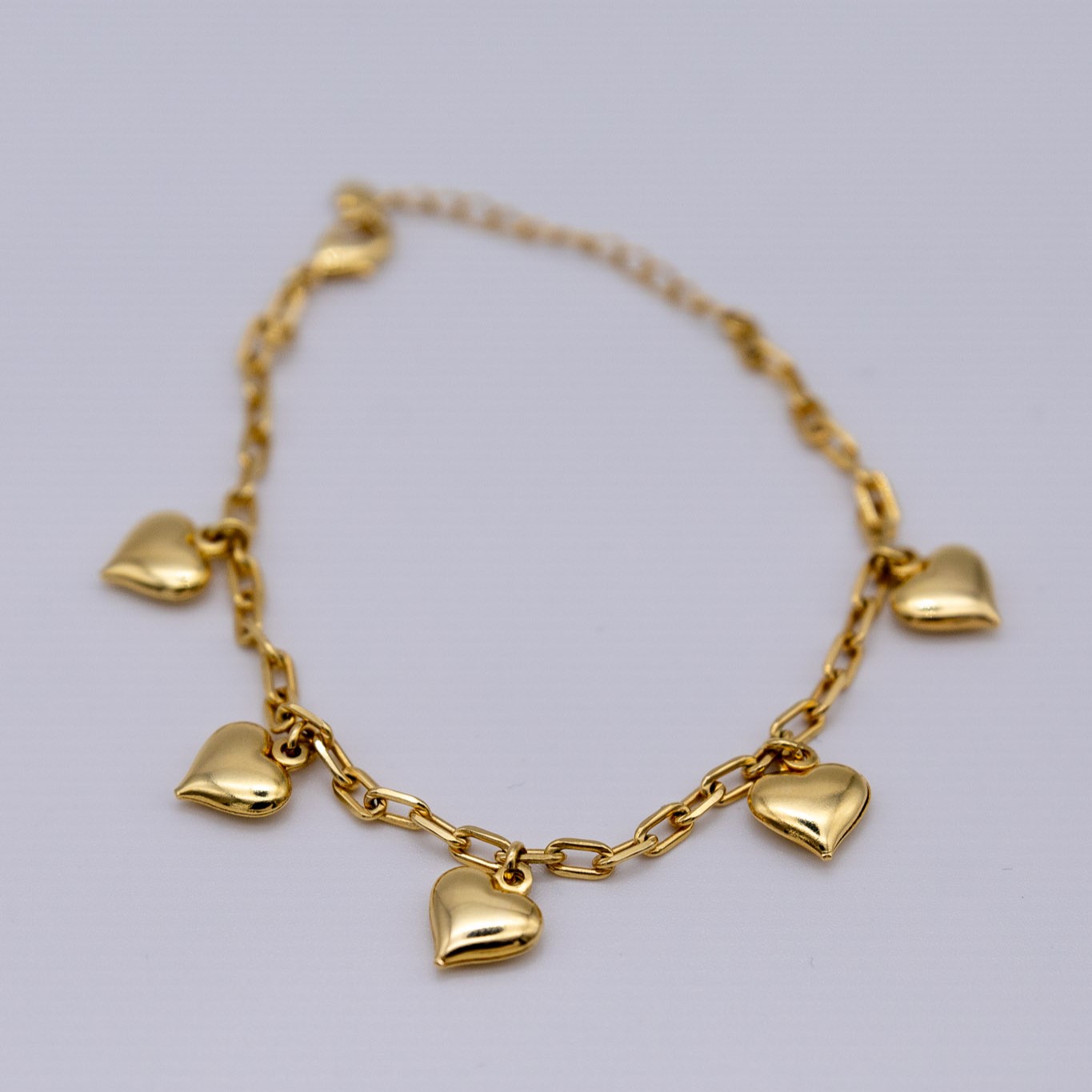 BRACCIALE CON 5 CUORI PENDENTI