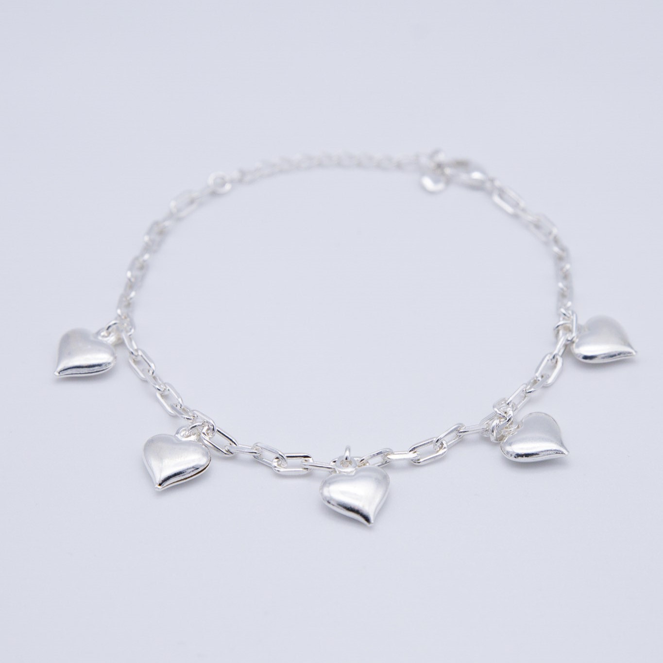 BRACCIALE CON 5 CUORI PENDENTI