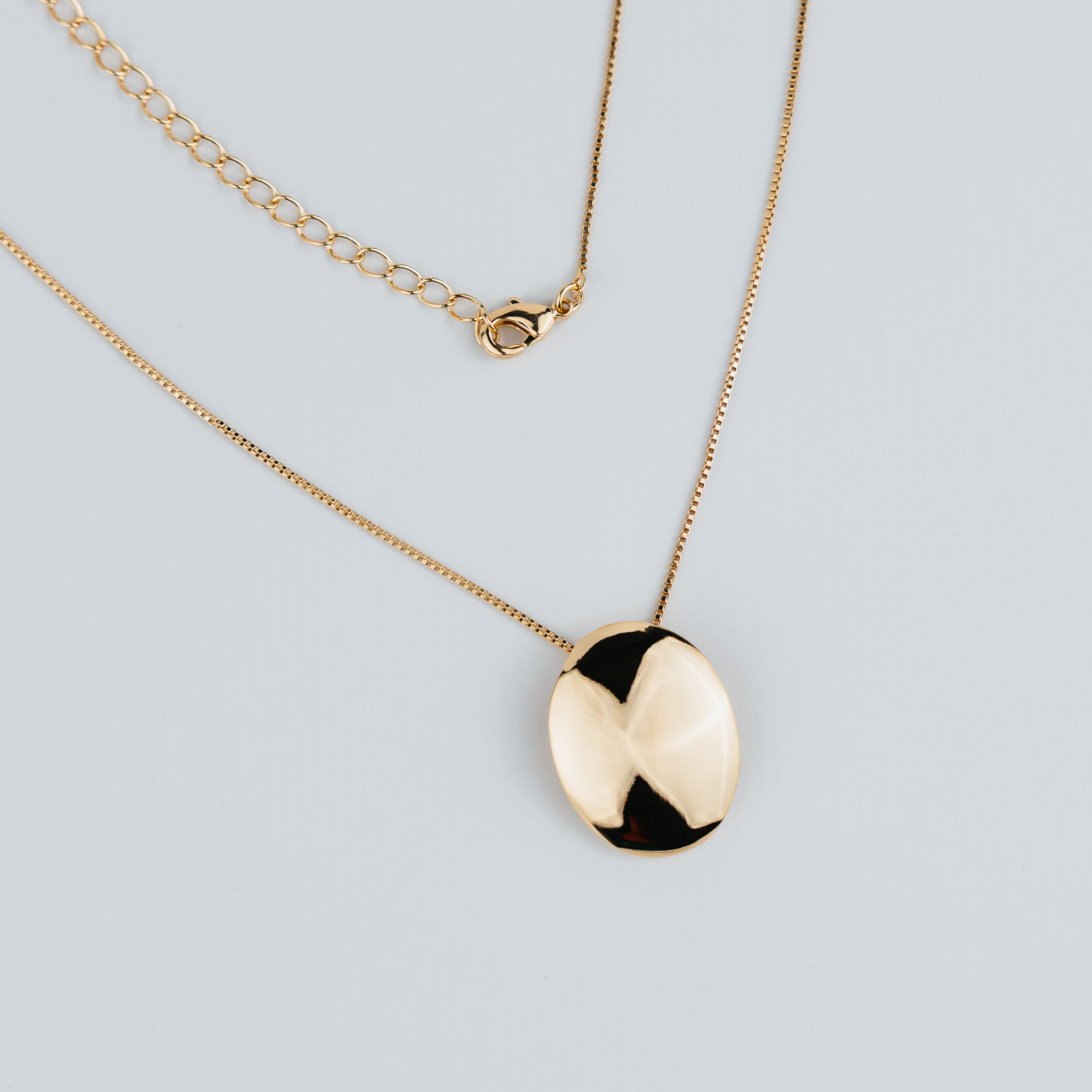 COLLANA CON PENDENTE ROTONDO LISCIO