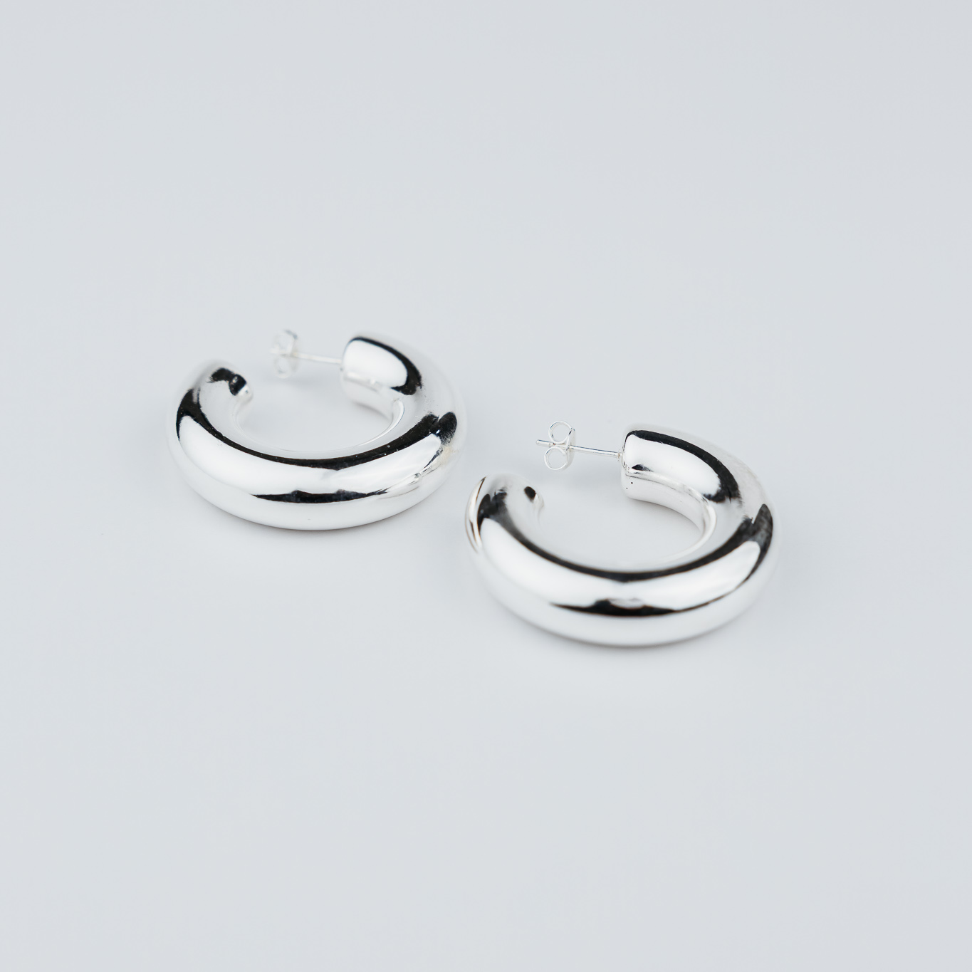 ORECCHINI A MEZZA ARGOLA SPESSI