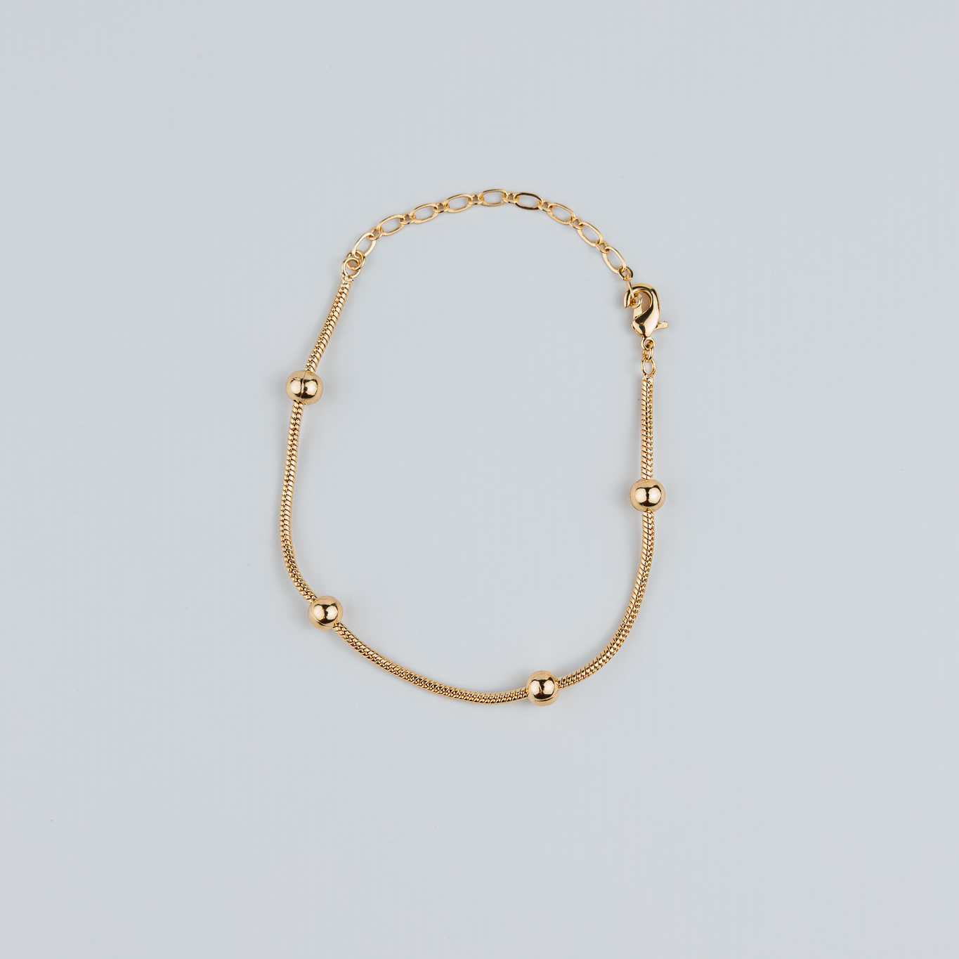 BRACCIALE A CATENA CON PALLINA