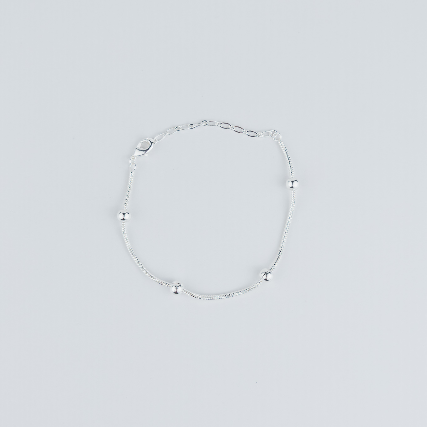 BRACCIALE A CATENA CON PALLINA