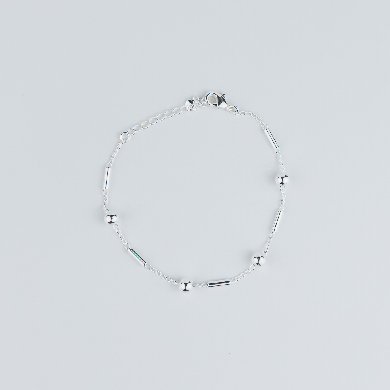 BRACCIALE CON PALLINE E SEPARATORE