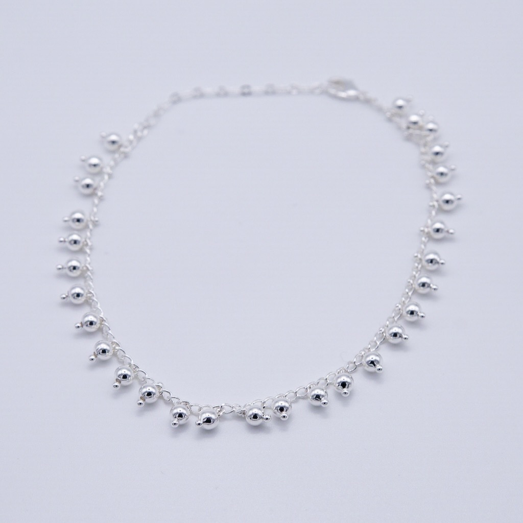 CAVIGLIERA CON SFERE PENDENTI