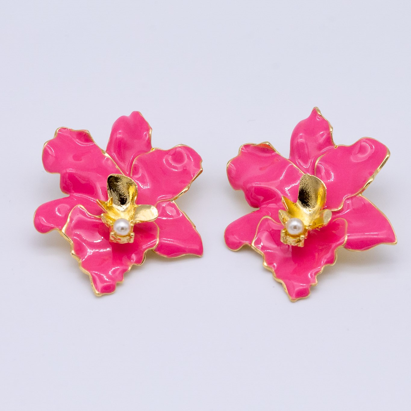 ORECCHINI IN RESINA CON FIORE