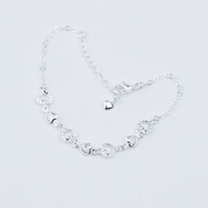 BRACCIALE CON CUORI TRAFORATI E PUNTI LUCE