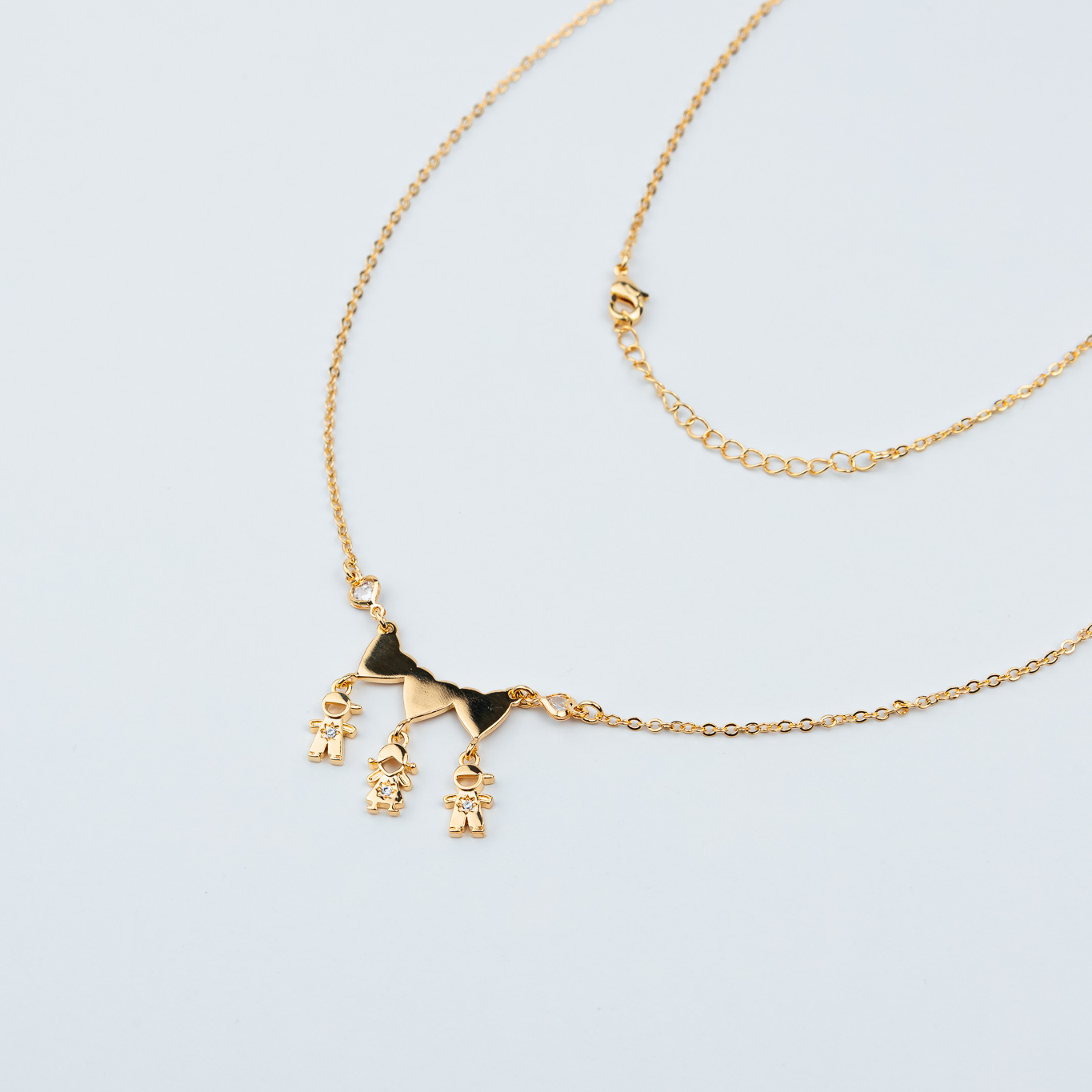 COLLANA DUE FIGLI E UNA FIGLIA CON TRE CUORI LISCI E UN PUNTO LUCE