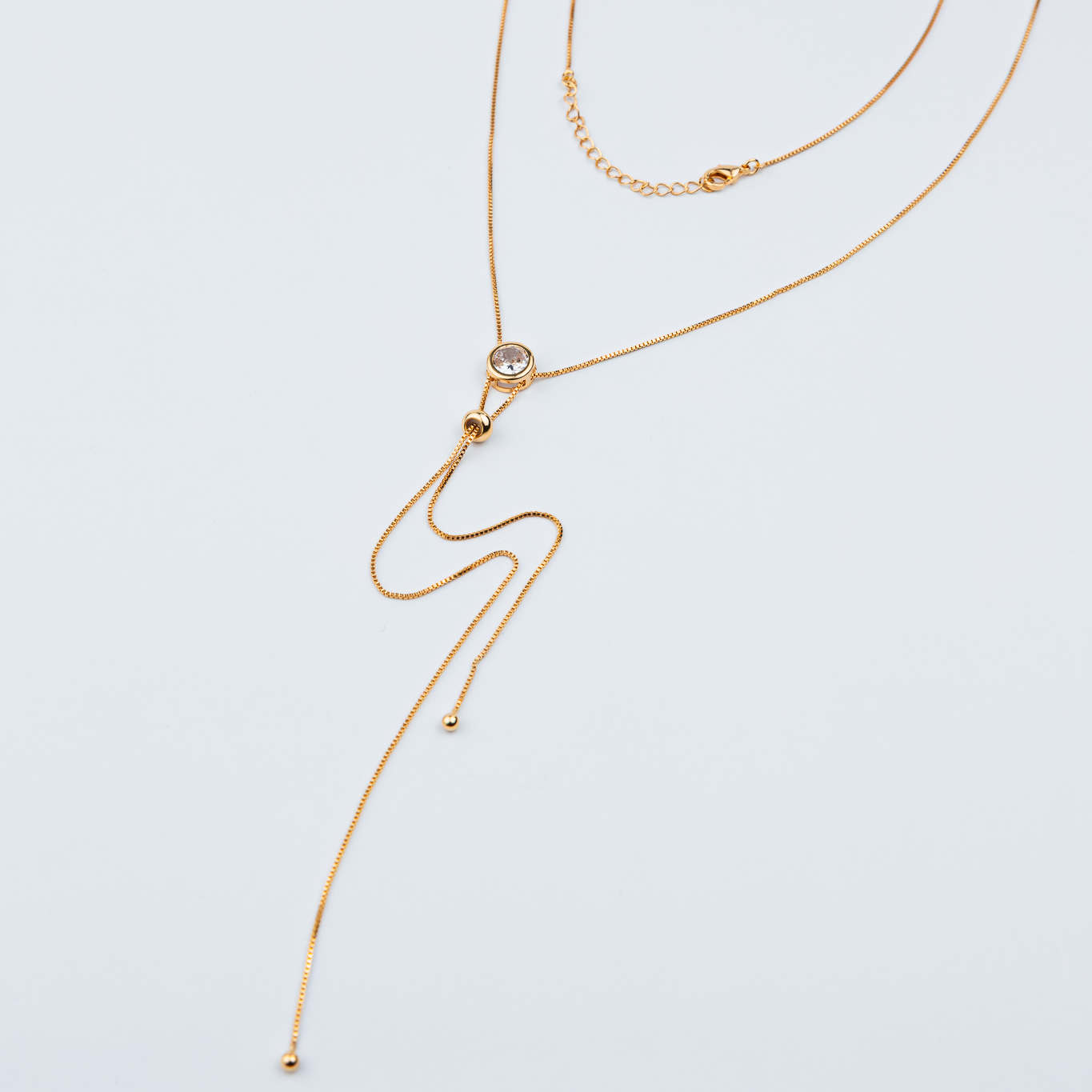 COLLANA A Y CON PUNTO LUCE ROTONDO IN ZIRCONIA