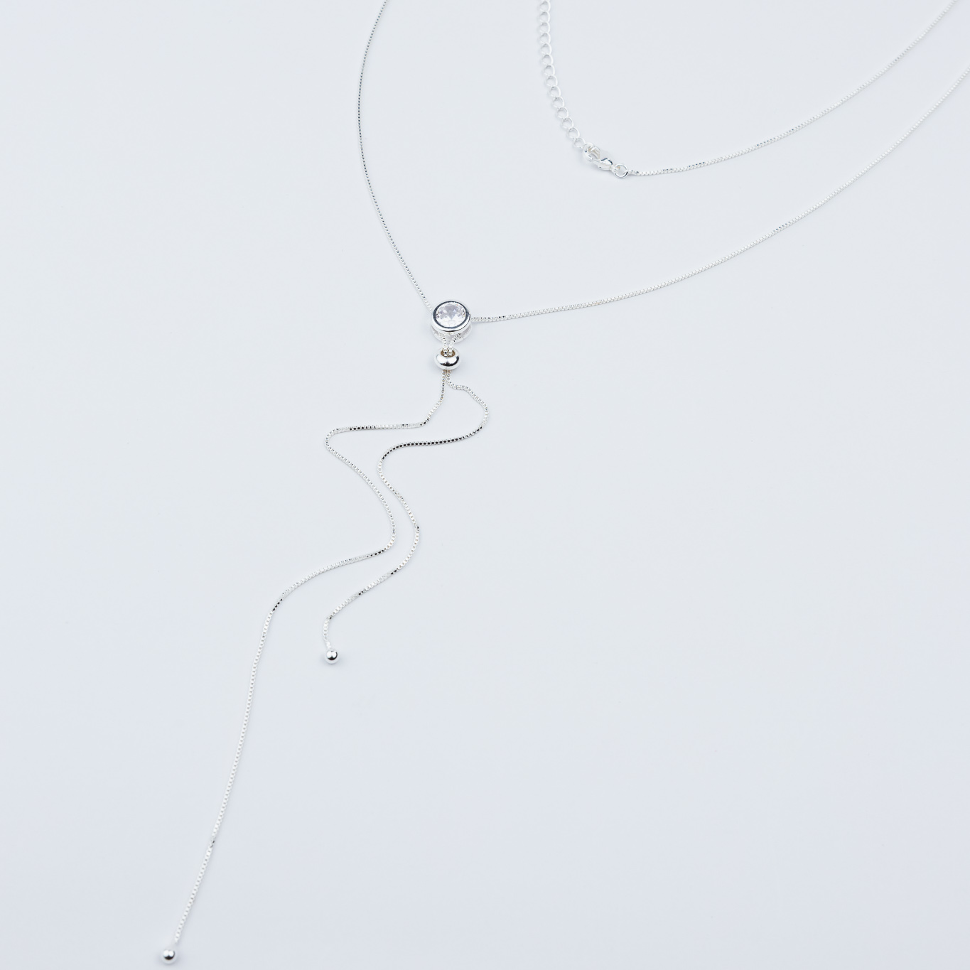 COLLANA A Y CON PUNTO LUCE ROTONDO IN ZIRCONIA